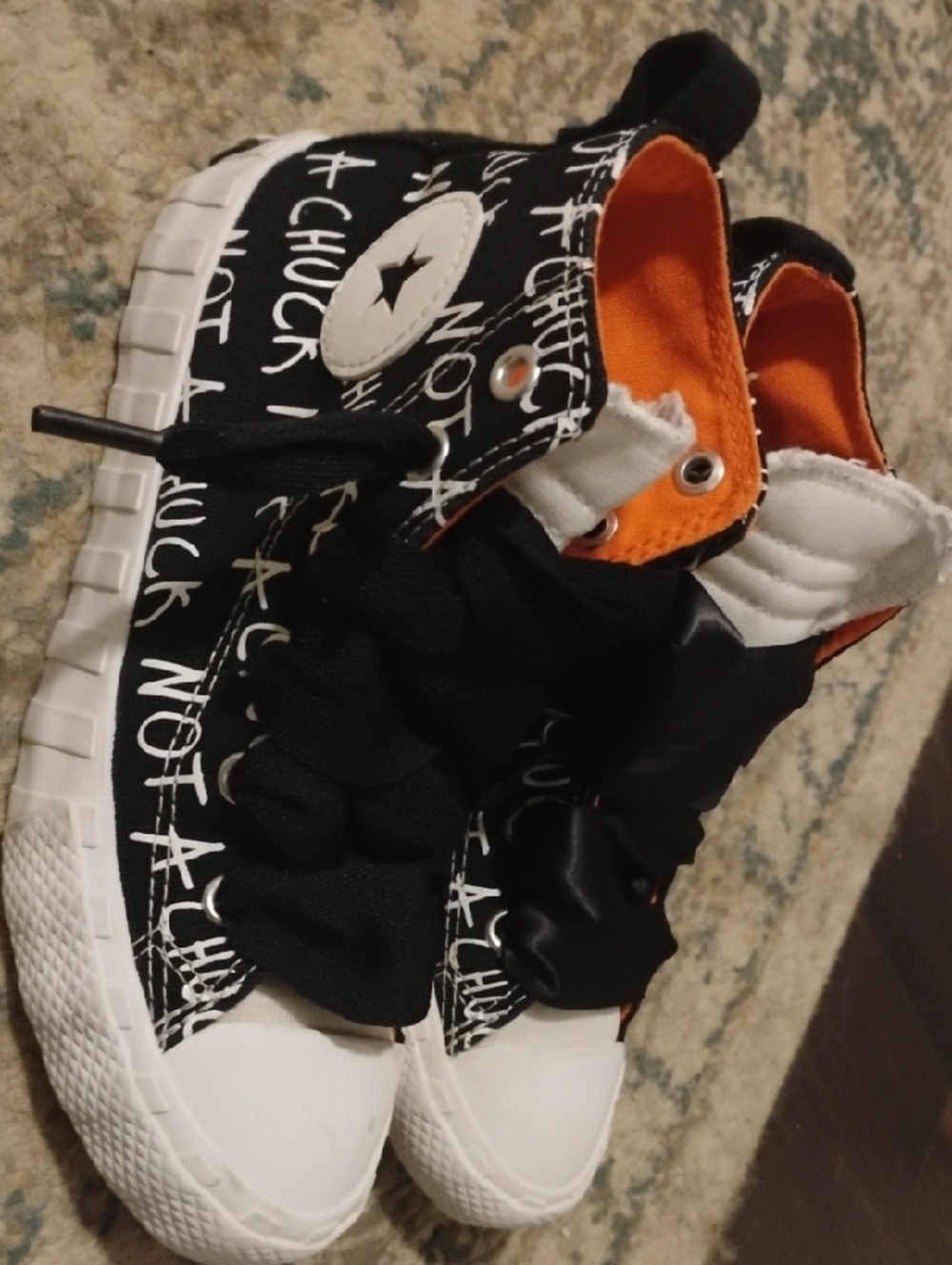 High-Top Girls Converse Chuck Taylor Sneakers in Black & White Size 1